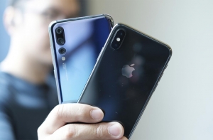 Apple и Huawei